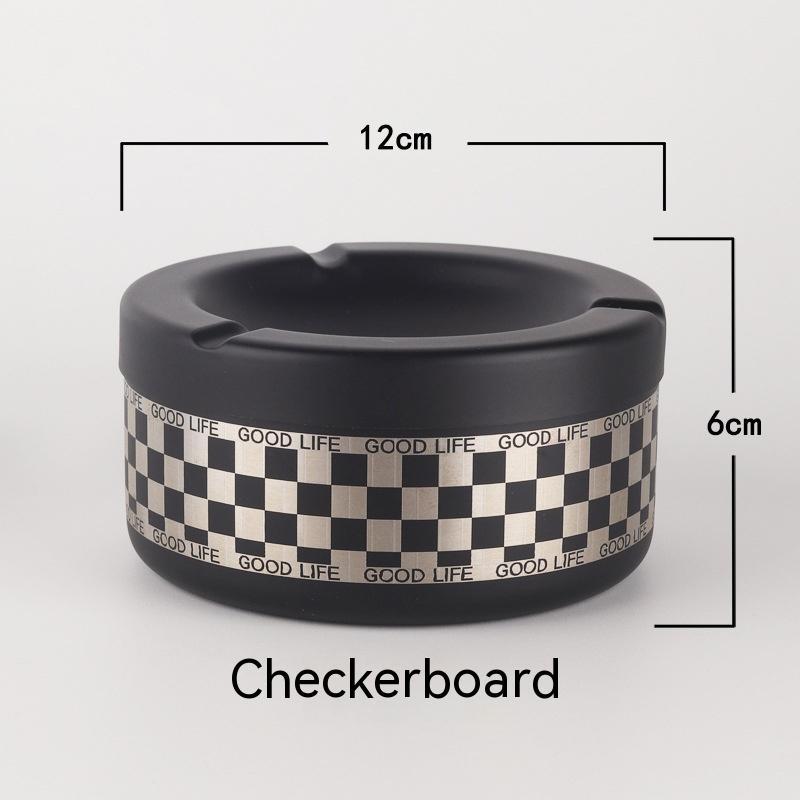Black ashtray with checkerboard pattern and measurements on a white background
